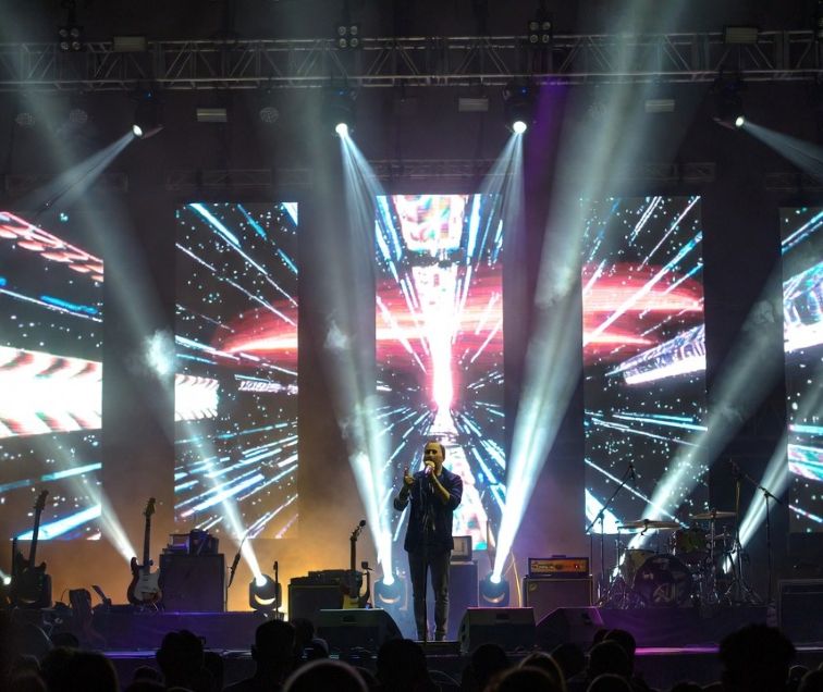 music performance with illuminated visual backdrops